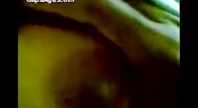 Lekha, an Indian aunty from Kerala, shows off her breasts in a free porn MMS video 1 min 10 sec