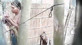 Secretly recorded outdoor shower of a village girl 2 min 30 sec