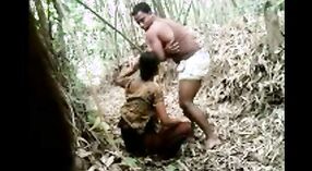 A young woman from a rural Indian community engages in sexual activity with her partner in a bamboo grove 0 min 0 sec