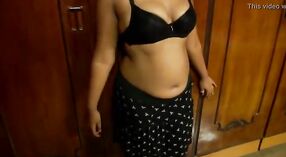 Sexy Indian woman undressing to her underwear in a steamy video 1 min 00 sec