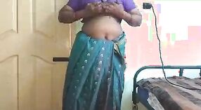 Homemade Indian MILF with big ass and shaved pussy in saree 2 min 00 sec