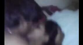 A slender Indian housewife indulges in intense sexual encounters with her partners, captured on video 1 min 40 sec