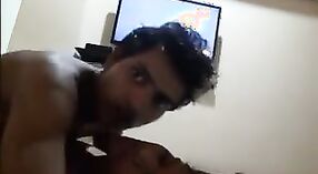 A newlywed Indian couple engages in passionate intercourse in a hotel room, captured in a new video 0 min 50 sec