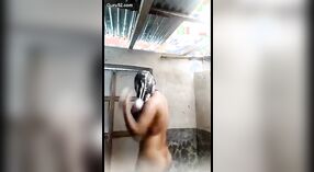 A girl from a rural Indian community shares a video of her bathing with her large breasts on display 0 min 0 sec