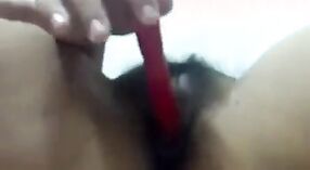 A seductive Telugu teen indulges in self-pleasure with a pen 5 min 20 sec