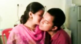 Passionate kissing in a college dorm room: A romantic Indian film 1 min 50 sec