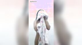 Charming Indian girl dressing up after showering 0 min 0 sec