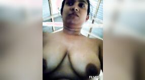 Indian woman displays her large breasts 2 min 20 sec