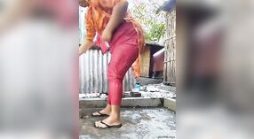 Two clips merged of secret bathing Bhabi in a rural Indian village 0 min 0 sec