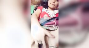 An Indian girl stimulating her hairless vagina 1 min 00 sec