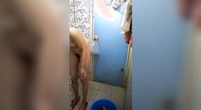 Undercover camera records a barefoot girls intimate bath 2 min 00 sec