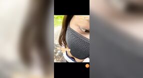 Young adult girl strips outdoors in a risqué display 2 min 40 sec