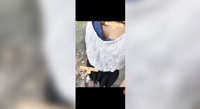 Young adult girl strips outdoors in a risqué display 3 min 20 sec