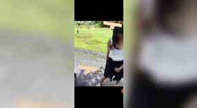 Young adult girl strips outdoors in a risqué display 5 min 20 sec