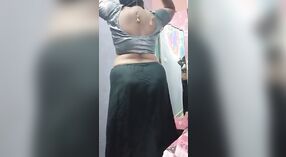 Solo Indian auntie in saree showcases her big tits and ass 1 min 40 sec