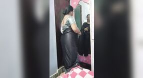 Solo Indian auntie in saree showcases her big tits and ass 3 min 20 sec