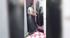 Solo Indian auntie in saree showcases her big tits and ass 4 min 40 sec