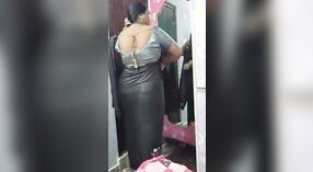 Solo Indian auntie in saree showcases her big tits and ass 5 min 00 sec