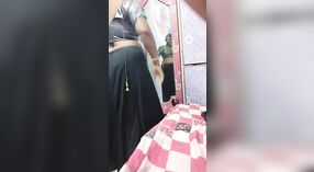 Solo Indian auntie in saree showcases her big tits and ass 0 min 40 sec