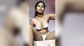 Indian girl pleasures herself with a dildo in steamy video 0 min 0 sec